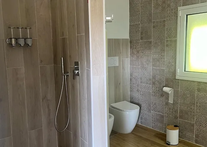 L 'alchitti Vendégház Budoni